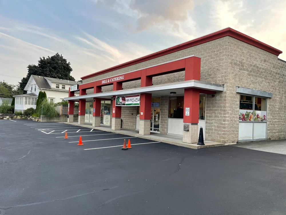 Commercial parking lot seal coating for deli and catering business